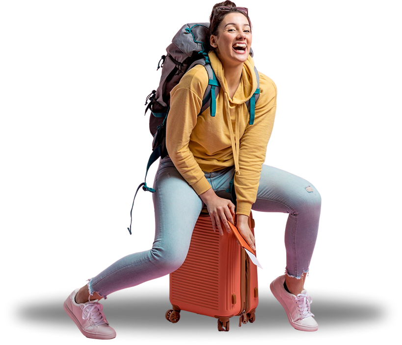 Traveler sitting on suitcase